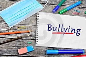 Bullying word on notebook
