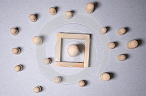 Bullying, workplace harass and loneliness concept. Wooden figurines on a desk