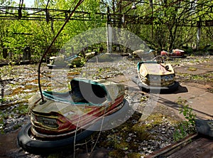 Bumper cars in abandoned amusement park in Pripyat town