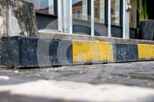 Bumper on Cement  floor texture,  wall texture background, wallpaper cements, wheel blocks in the park.