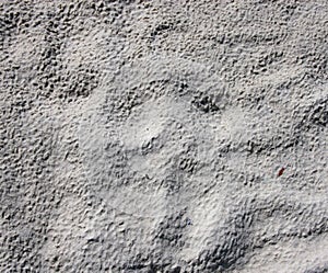 Bumpy dry empty gray sand texture background