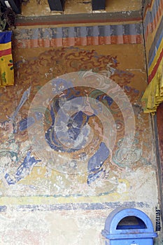 Guardian Lord deity fresco outside temple