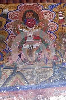 Guardian Lord deity fresco outside temple