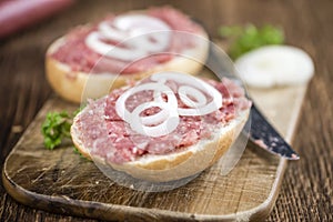 Bun with Mett (German cuisine; selective focus)