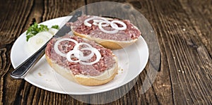 Bun with Mett (German cuisine; selective focus)