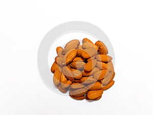Pie of almonds on white background