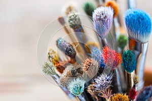 Bunch of artist paintbrushes closeup. photo