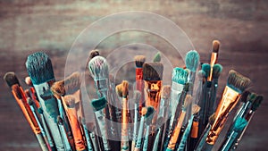 Bunch of artistic paintbrushes. Retro toned.