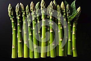 Bunch of asparagus on a dark background. Generative AI