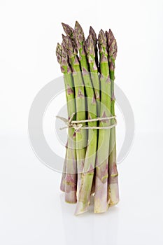 Bunch of asparagus tied with raffia cord