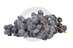 Bunch of black grapes isolated on white background