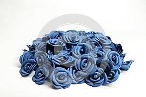 A bunch of blue roses on white background