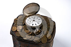 A bunch of coins with a pocket watch on top of Vintage jewelry box