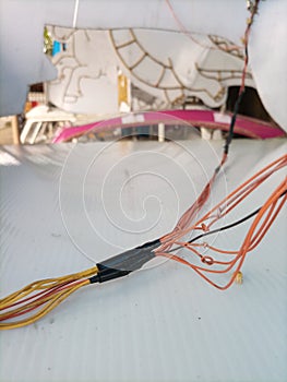 A bunch of colorful electrical wire connections