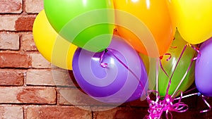 Bunch of colorful helium balloons photo