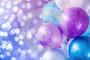 Bunch of colorful helium balloons floating on colorful bokeh background
