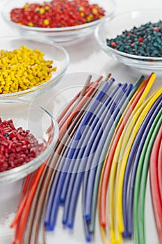 Bunch of colorful plastic tubes photo