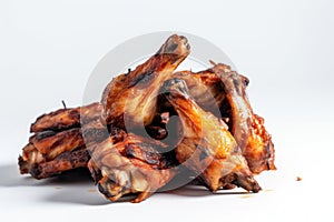 Bunch of cooked barbecue chicken wings on a white background. Generative ai