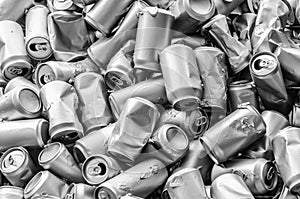 bunch of crumpled empty aluminum cans. concept of processed waste. Background, piles of crushed cans