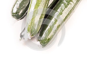 Bunch of cucumber wrapped in plastic films