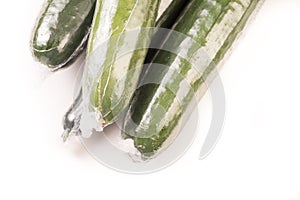 Bunch of cucumber wrapped in plastic films