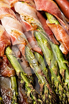 Bunch of delicious asparagus wrapped in bacon grilled