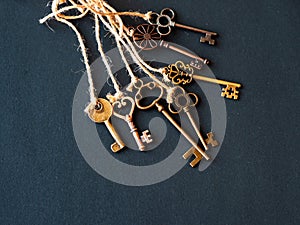 A bunch of different old keys from different locks. Finding the right key, encryption, concept.