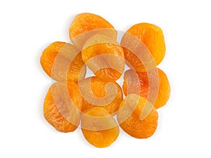 A bunch of dried apricots isolated on a white background, close-up macro photo, top view.