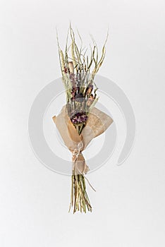 Bunch of dried herbs for tea isolated on white background