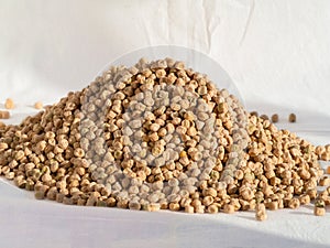 A bunch of dry yellow peas. Close-up of dry green peas. Green Pea Seeds for healthy vegetarian food with high nutrient content