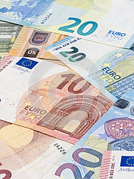 Bunch of euro banknotes. Many Euro bills lie on top of each other. Pile of money of the European Union. Currency of the united