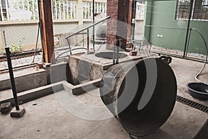 Bunch of farming tools and objects in an outdoor shed