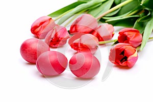 Bunch of flowers near Easter eggs. Bouquet of spring tulips