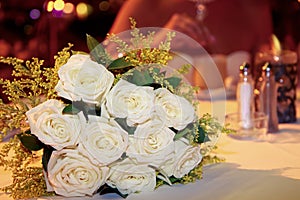 Bunch of flowers white roses on the table, wedding objects photography