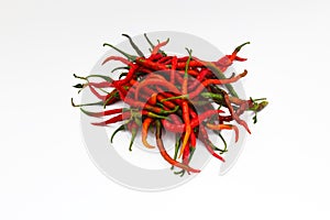 a bunch of fresh curly red chilies (Cabai Merah Keriting) isolated on white background.