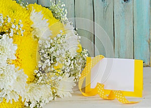 A bunch of fresh flowers in yellow and white