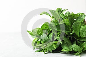 Bunch of fresh green mint on table, closeup