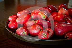 Bunch of fresh ripe red skin Jamaican Otaheite apples. Popular tangy flavor fruit in Jamaica & the Caribbean culture.