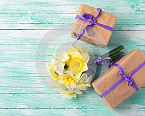 Bunch of fresh spring flowers and gift boxes