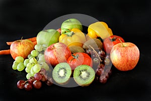 Bunch of fruits on black background