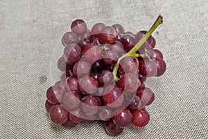 Bunch of grapes on natural sackcloth