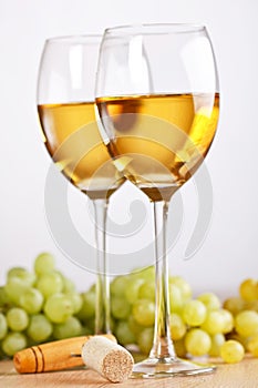 bunch of grapes and white wine