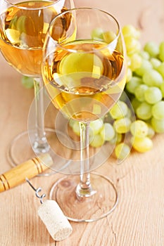 Bunch of grapes and white wine