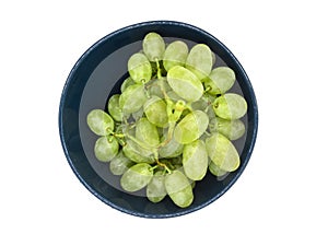 Bunch of green grapes in a plate isolated on white background