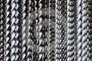 Bunch of hammer power drill bits in hardware store background, small depth of field