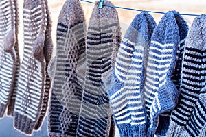 Bunch of handmade colorful woolen socks