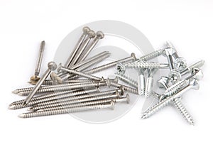 Bunch of inox nails and screws close up