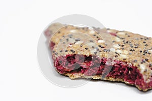 Bunch of integral fruit biscuits with cherries isolated on white background. Healthy food, copy space. Integral biscuit isolated