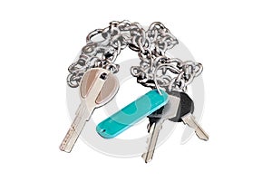 A bunch of keys on a chain, isolated on a white background