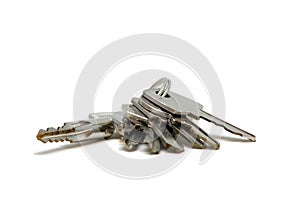 Bunch of keys on keyring isolated on white background